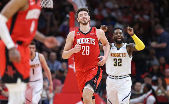 Apr 4, 2023; Houston, Texas, USA; Houston Rockets center Alperen Sengun (28) and Denver Nuggets forward Jeff Green (32) react after a play during the third quarter at Toyota Center. Mandatory Credit: Troy Taormina-USA TODAY Sports